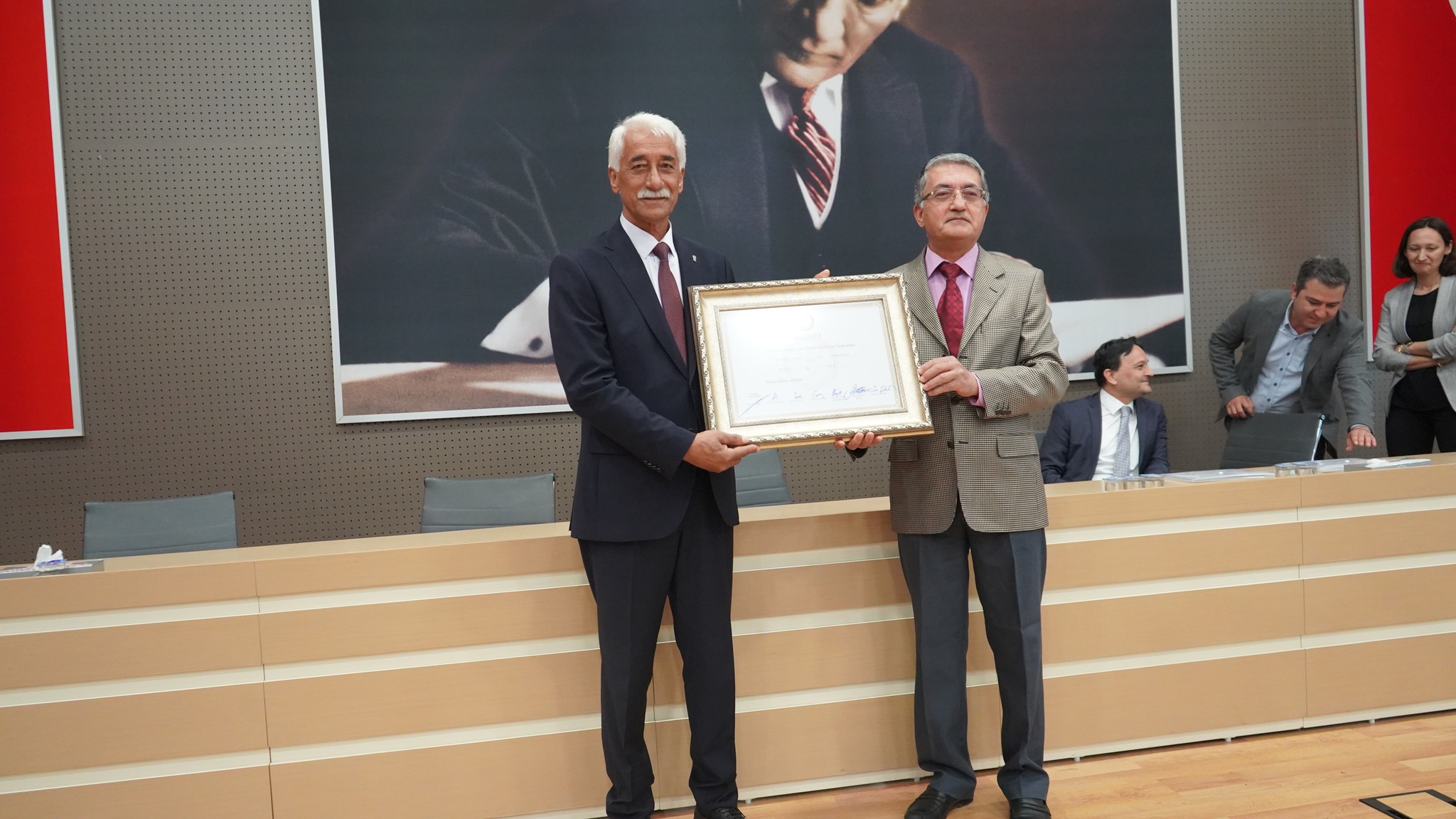 Ula Belediyesi’nde Devir Teslim: Mehmet Caner Görevine Başladı