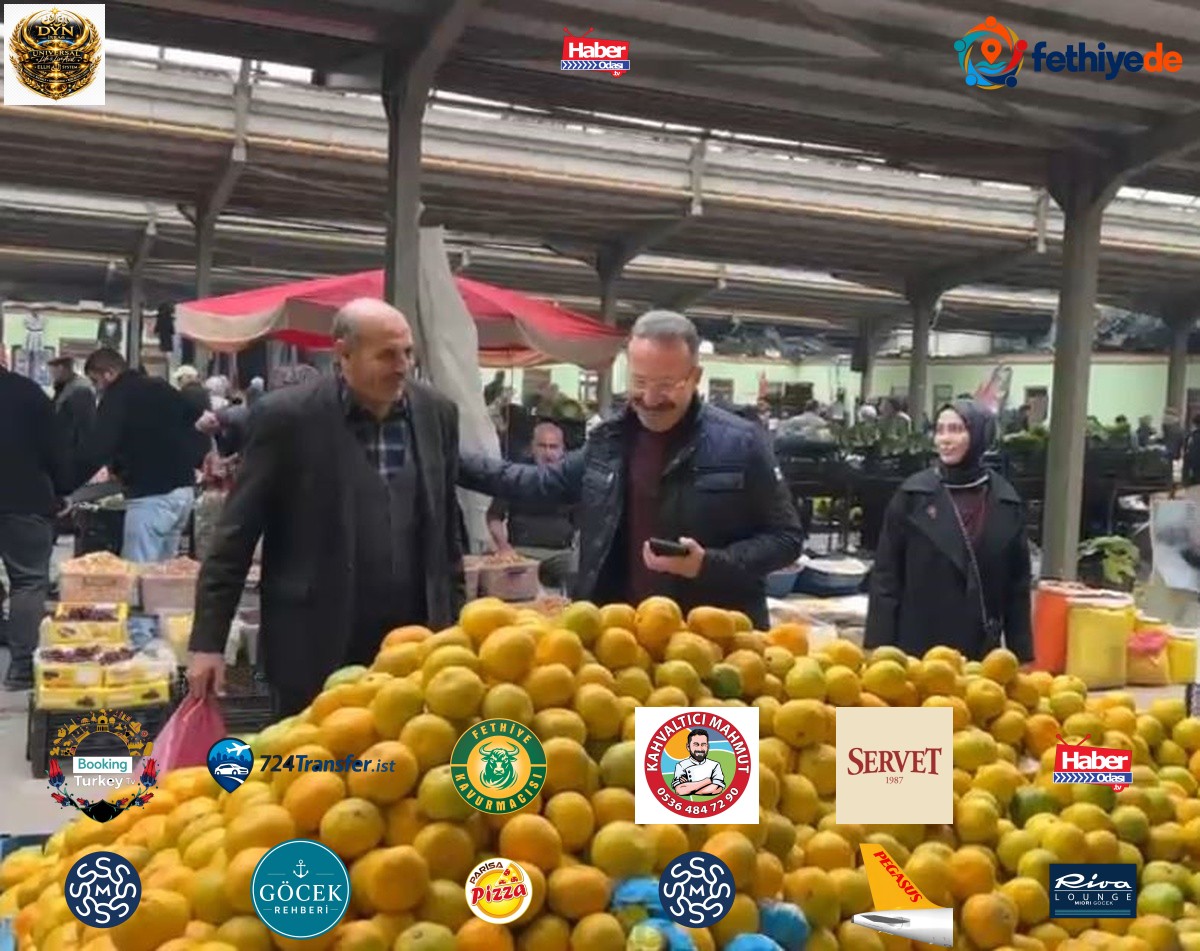 Ardahan Valisi Ömer Hilmi Yamlı eşiyle pazarda alışveriş yapıp esnafla sohbet etti